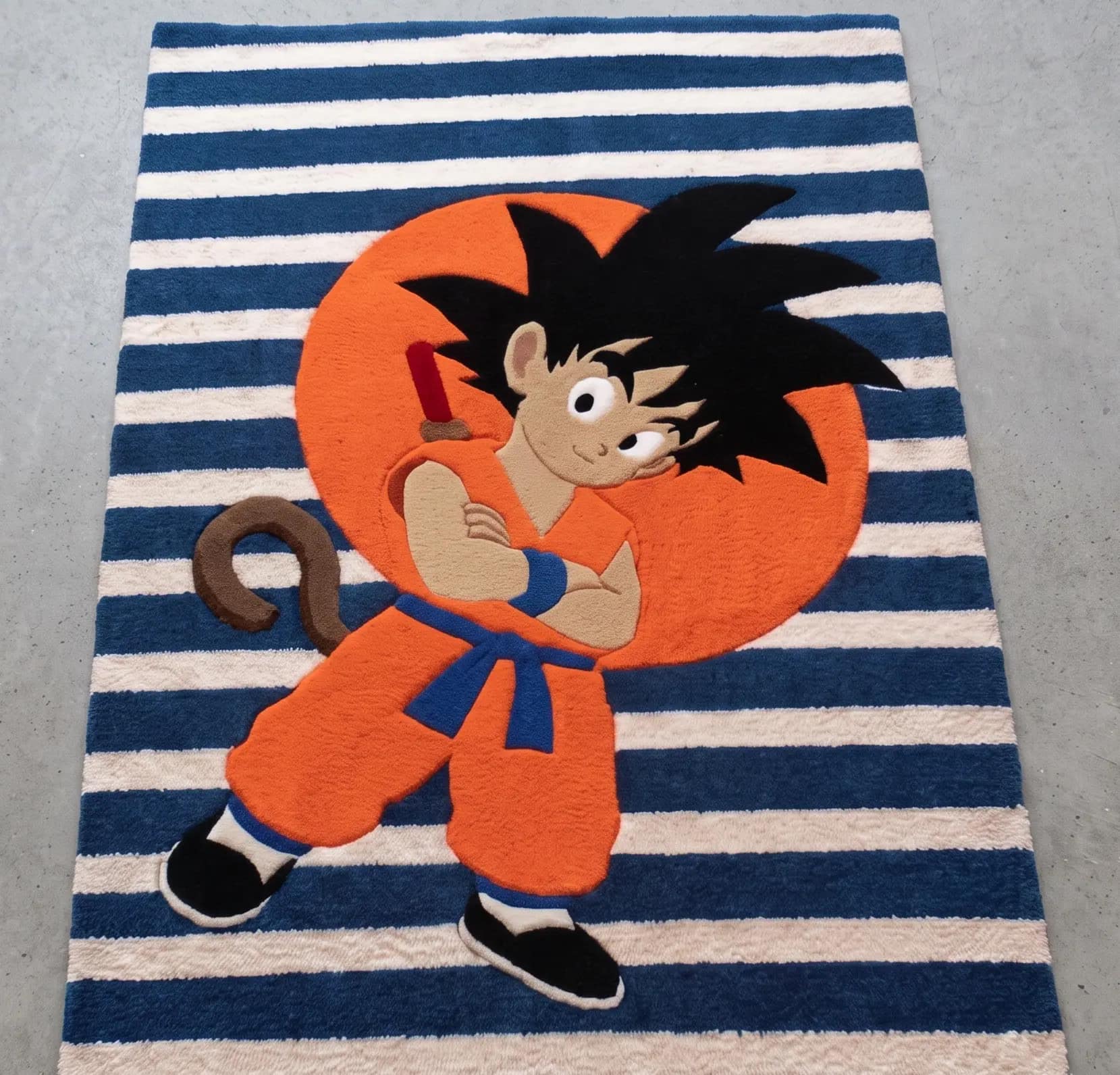 Kid Goku Power Pole Tufted Anime Rug – Striped Background Decorative Accent Carpet for Kids & Gamers